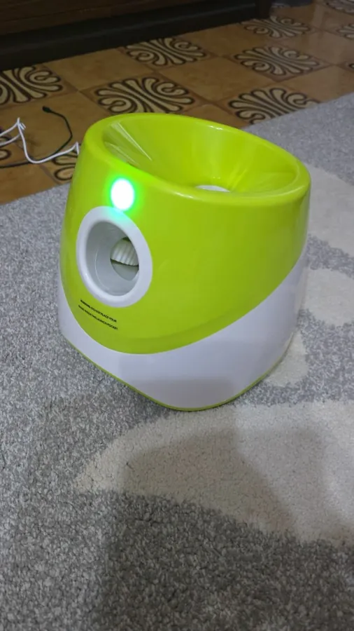 The launcher on a rug, indicator light on